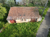 Old stone workshop with patio located in a quiet village.