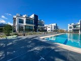 2 BED GROUND FLOOR APT WITH COMMUNAL POOL & MOUNTAIN VIEW IN ALSANCAK