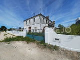 Manor house to restore inserted in land facing the River Nabão.