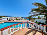 A villa with spectacular views over the harbour of Addaia and the North coast....