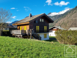 A 4 bedroom, 2 bathroom chalet on a flat plot, with modernisation potential