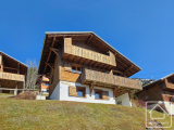 A modern, four bedroom chalet with far reaching views and lots of sunshine!