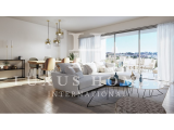 Modern middle floor apartment with a large terrace, community pool and great sea views, located clos