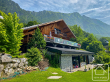Detached Chalet with Two Separate Living Units – A stunning Renovation offering exceptional views in