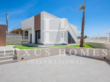 Elegant villa with private pool, large garden, roof top terrace, located in a golf resort urbanisati