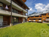 Ski-in/ski-out studio apartment with south-facing balcony and storage.