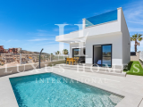 Beautiful villa with private pool, large garden, roof top terrace, located in a golf resort urbanisa