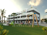 Stunning ground floor apartment with large terrace, private garden, community pool, spa area, locate