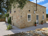 Beautifully Restored 3-Bedroom Stone Home with Modern Comforts and Extensive Land