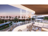 Beautiful ground floor apartment on the first line of the beach boasting a private garden, a terrace