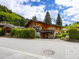 5 bedroom chalet, 2 bathrooms, sauna, double garage, carport, and garden.
