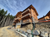 A super, mixed programme of new-build apartments and chalets, in a sunny setting with the ski bus st A super, mixed programme of new-build apartments and chalets, in a sunny setting with the ski bus st