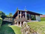 Spacious chalet divided into 2 apartments, with a double garage.