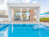 Luxury villa with large roof top terrace, garden and private pool located close to the beach