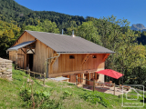 A high end renovation of a secluded alpine farm with three bedrooms, satellite internet, views, and 