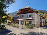 A charming village house with 3 bedrooms, a garden and a separate mazot with scope to develop furthe