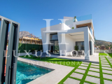 Key-ready luxury villa with a large roof top terrace, private pool and stunning sea view located nex