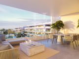 Modern apartment with spacious terrace, resort-style pools and bicycle parking, nestled close to bea