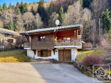 A delightful 4-bedroom chalet with garage, large terrace, and garden