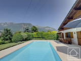 Immaculate chalet with swimming pool with sensational views and sunshine.