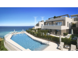 Fantastic seafront townhouse with spacious terraces, communal pool and private parking, placed in a 