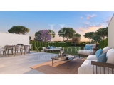 Luxurious townhouse on golf course with spacious garden, terraces and communal pool amidst greenery