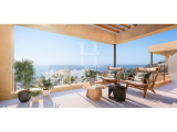 Luxury penthouse with stunning sea views, large roof top terrace, community pool located in a privil
