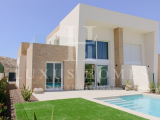 Stunning elegant villa with panoramic outdoor views and a generous garden with a private pool surrou
