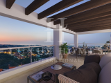Charming middle floor apartment with terrace, pool and fitness amenities in a prestigious golf setti