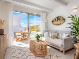 Charming ground floor apartment with a small private garden, terrace, pool and parking situated in a