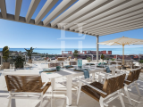 Spacious fantastic beach penthouse with community pools, a gym and massive rooftop terrace capturing