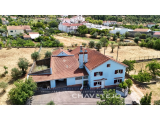 Exceptional Country Home with Extensive Workshops, Flat Land and Outstanding Potential